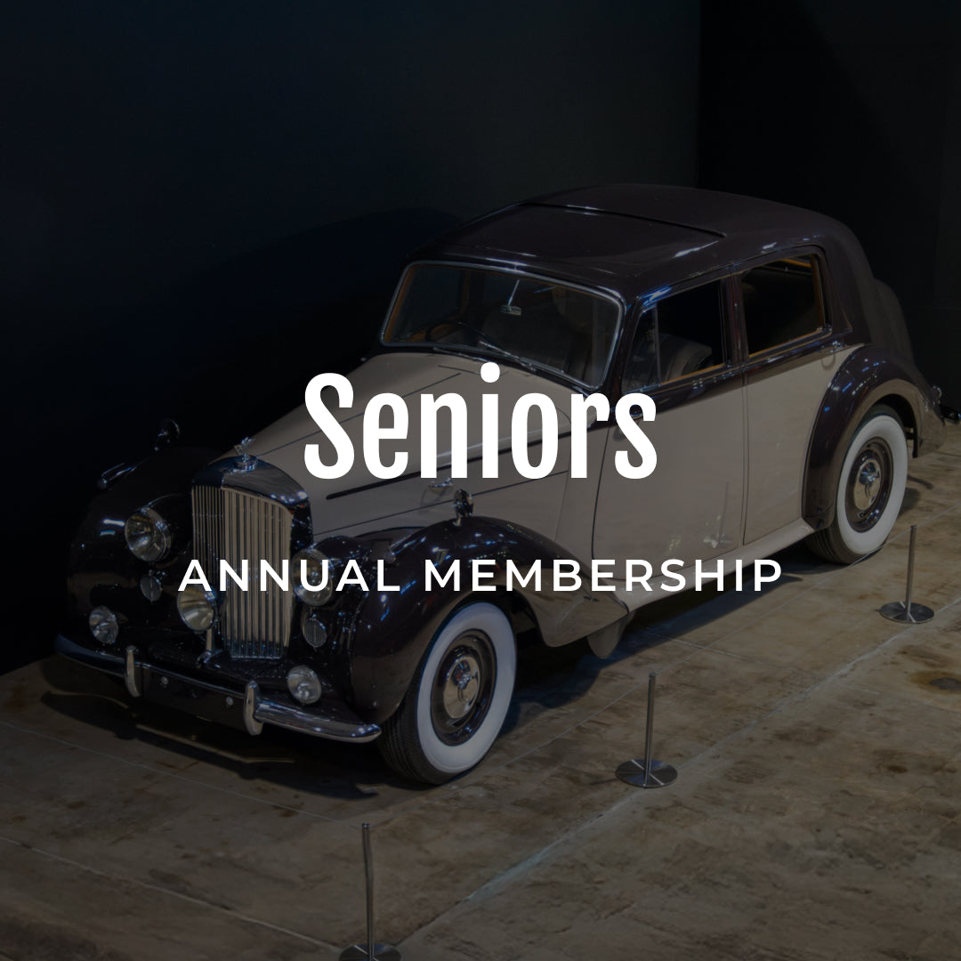 Vintage car on display with 'Seniors Annual Membership' text overlay